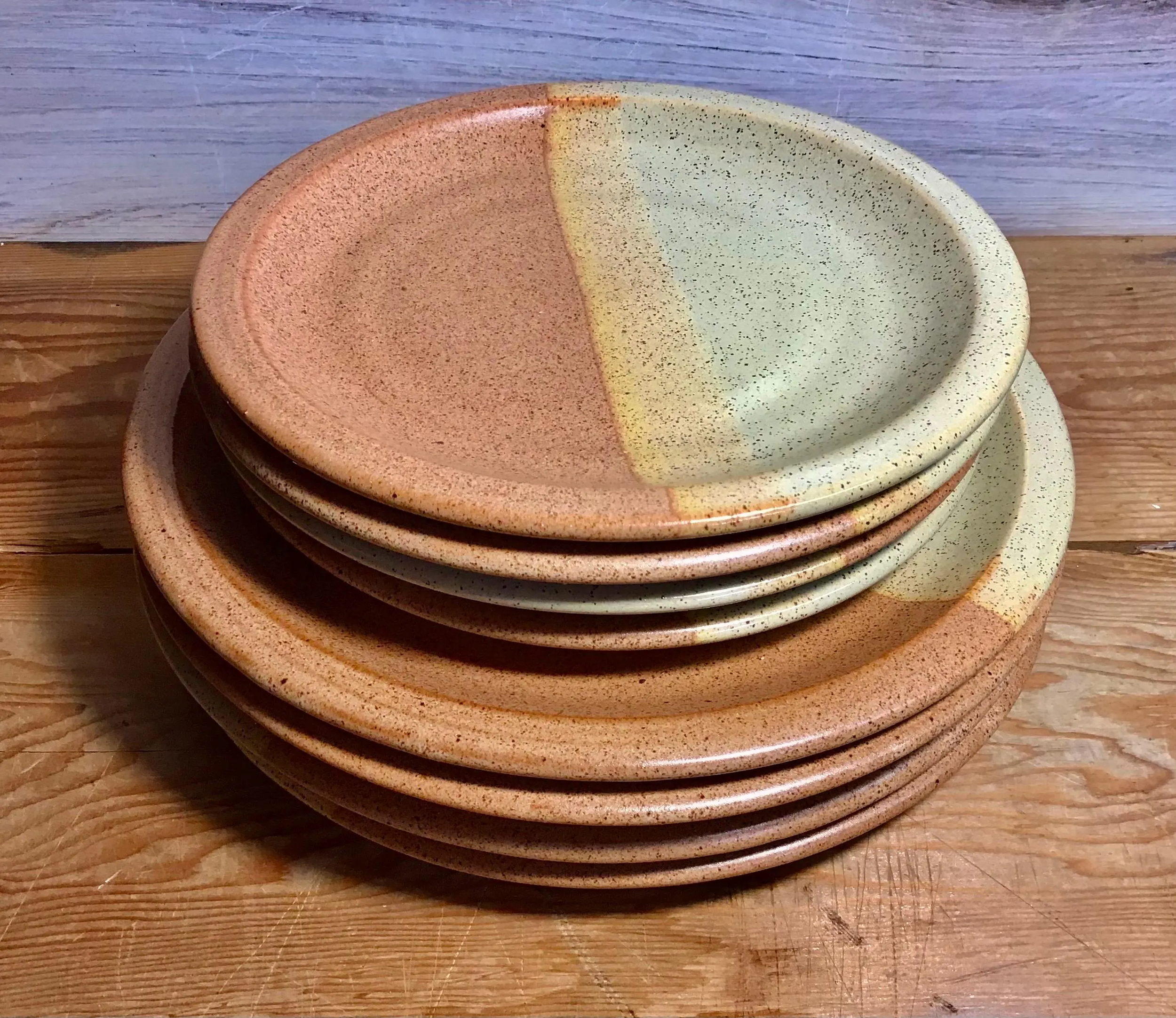 stack of nutmeg sahara dinnerware.png