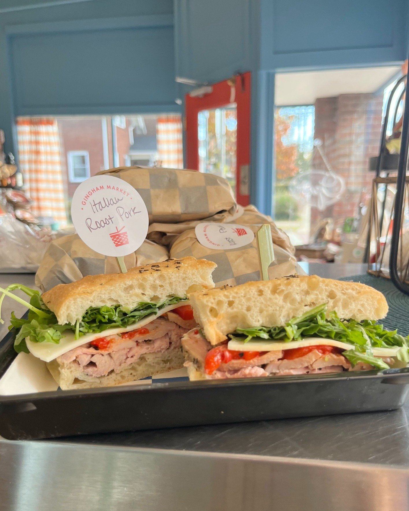 The case is stocked and ready for you THURSDAY! 💙 Our GRAB &amp; GO features our Italian Roast Pork on Focaccia, classic Turkey on a Kaiser Roll, and Beef Vegetable Soup -- the team is here until 6pm! 🧺 #ginghammarket