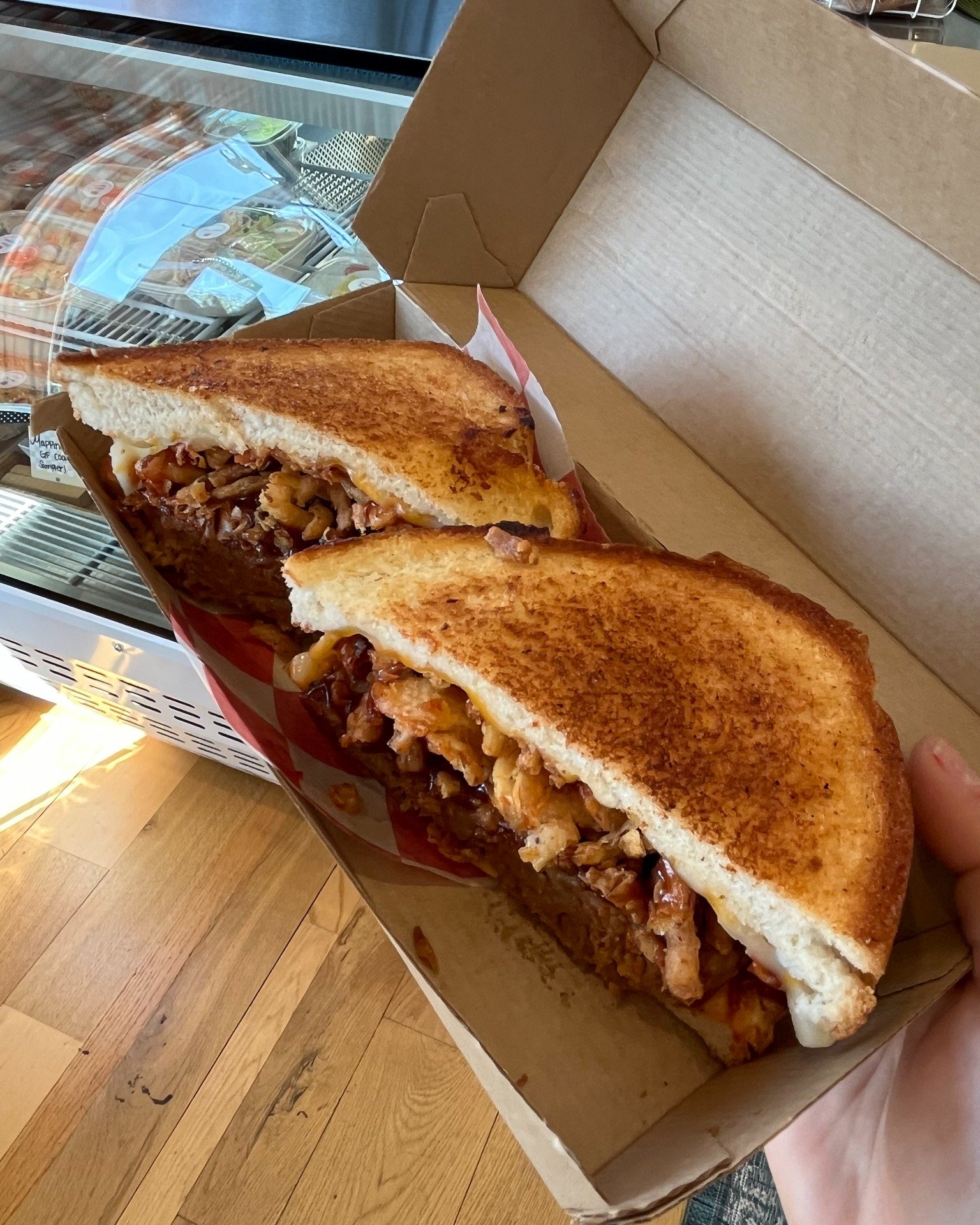 Hey, FRIDAY! 💙 Our MEATLOAF is back &mdash; made to order on Griddled White with BBQ, Crispy Onions, and Colby Jack. Stop in to kick off a well-deserved weekend. The team is here until 6pm! #ginghammarket