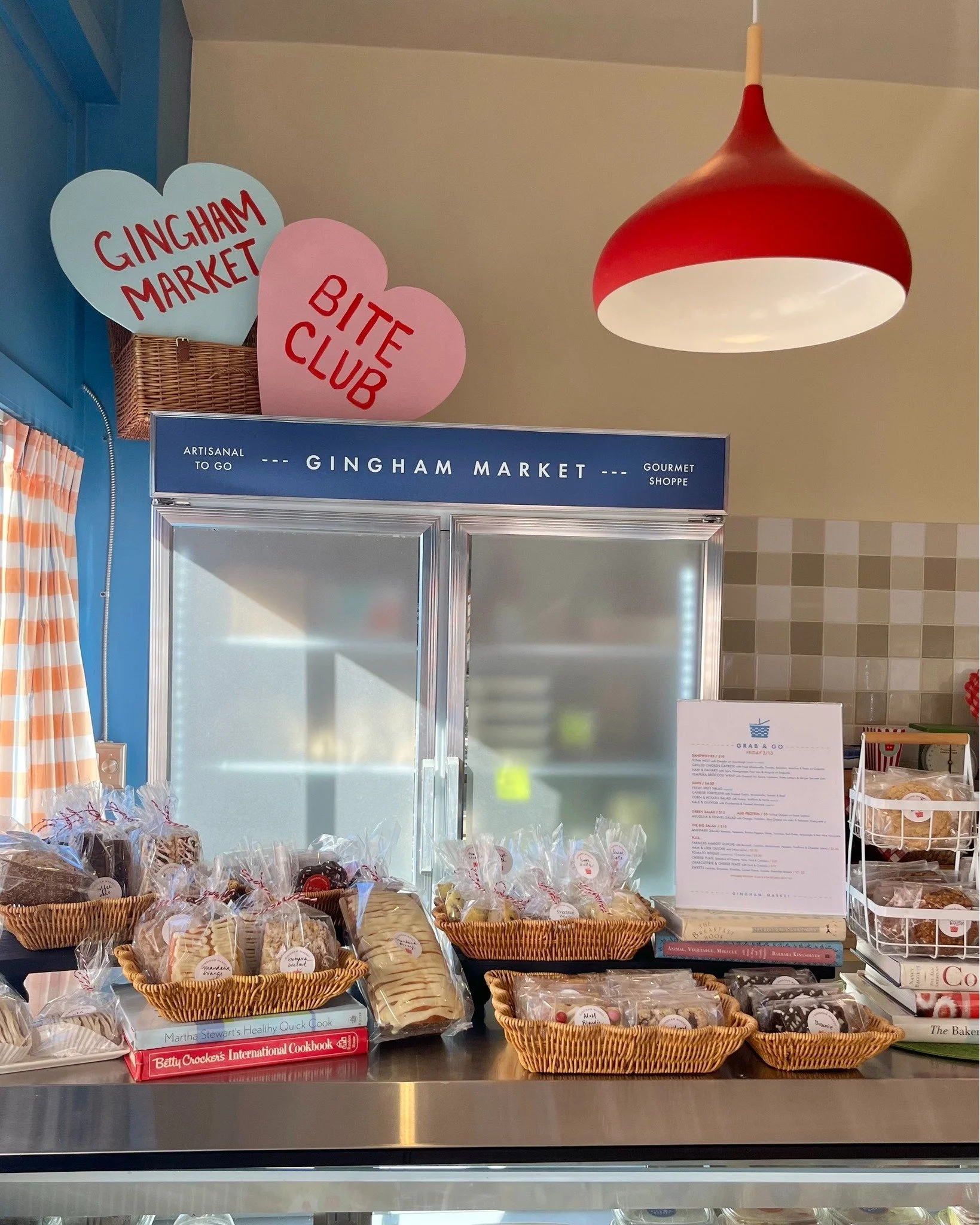 Come and get some GINGHAM love, Friday! 💙🧺 The MARKET is stocked with lots of treats and a little extra love this weekend. Stop in for our Friday 2/13 GRAB &amp; GO featuring Tuna Melts, Ham &amp; Havarti with @jessspicyjams and Tomato Bisque! The 