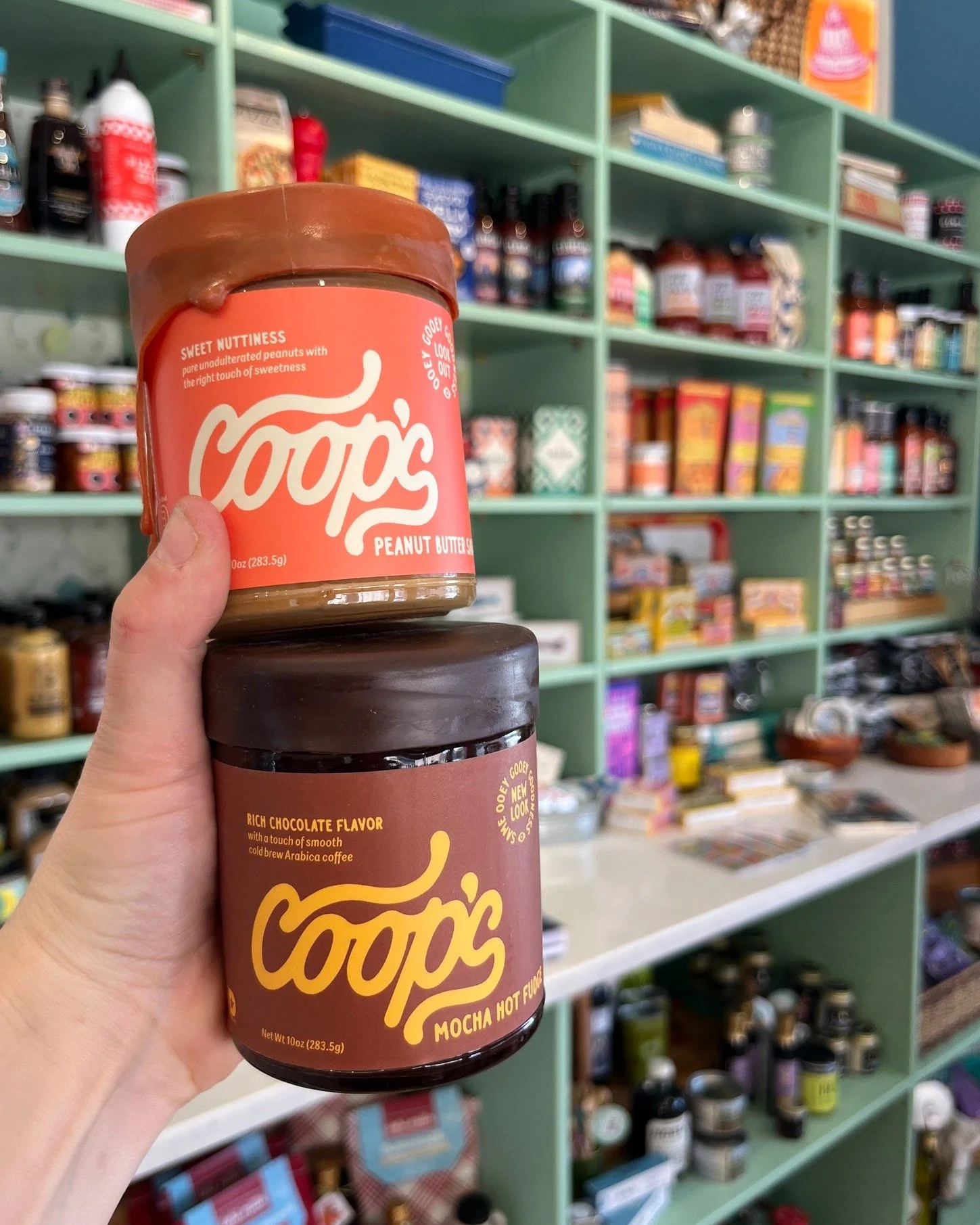 Restocked and ready for your sweet tooth. 🧺🍫 Coop&rsquo;s Original and Mocha Hot Fudge are back on the shelves, now joined by NEW Peanut Sauce. Perfect for ice cream nights, brownie topping, coffee, or a little spoonful straight from the jar (we wo