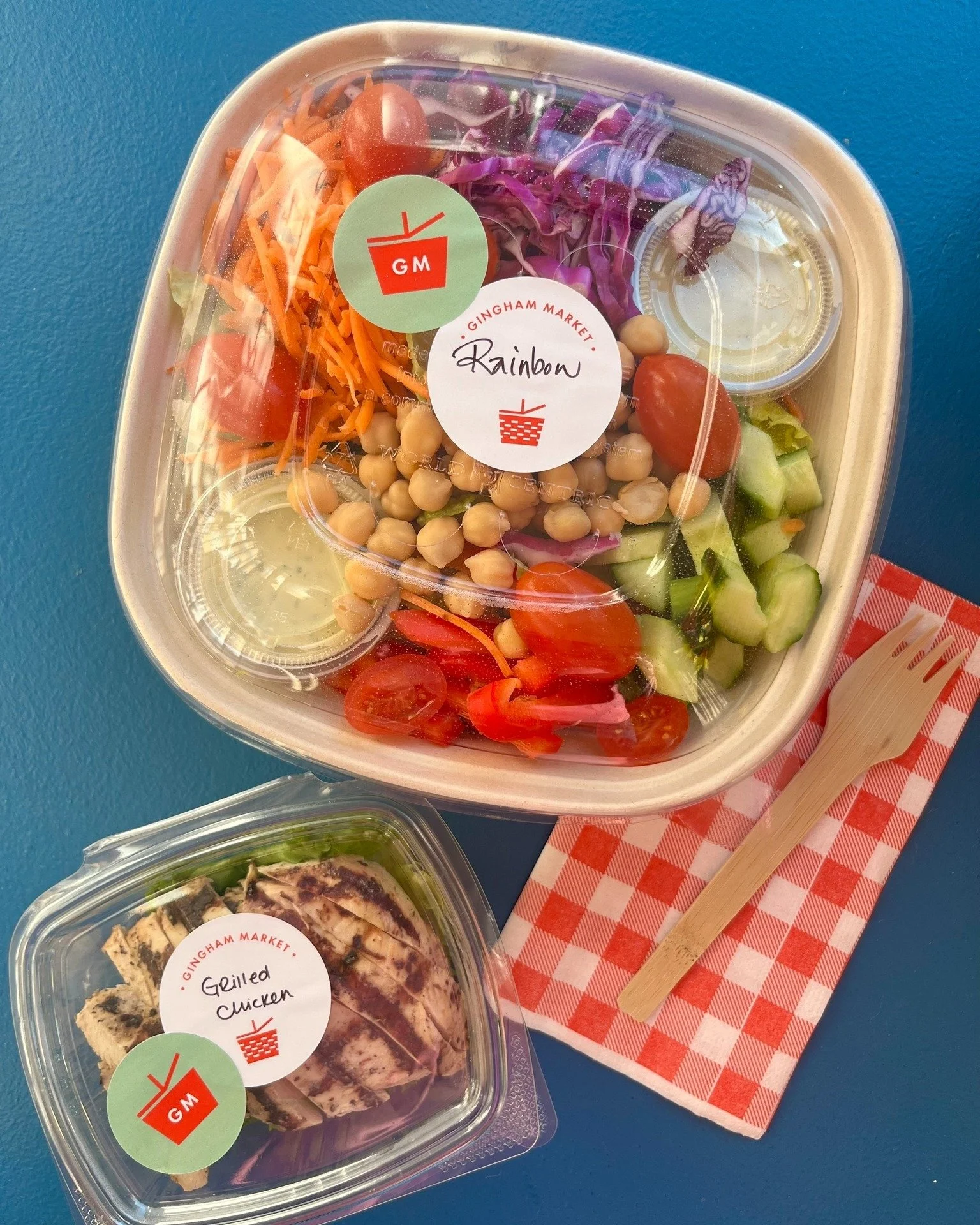 The sun is shining, and GINGHAM lunch is calling! 🥗💙 Our Rainbow Salad is the featured BIG SALAD available all week, add a side of chicken or pair with a sandwich! Here is the Thursday, 2/26 GRAB &amp; GO menu, the MARKET is open until 6pm. 🧺