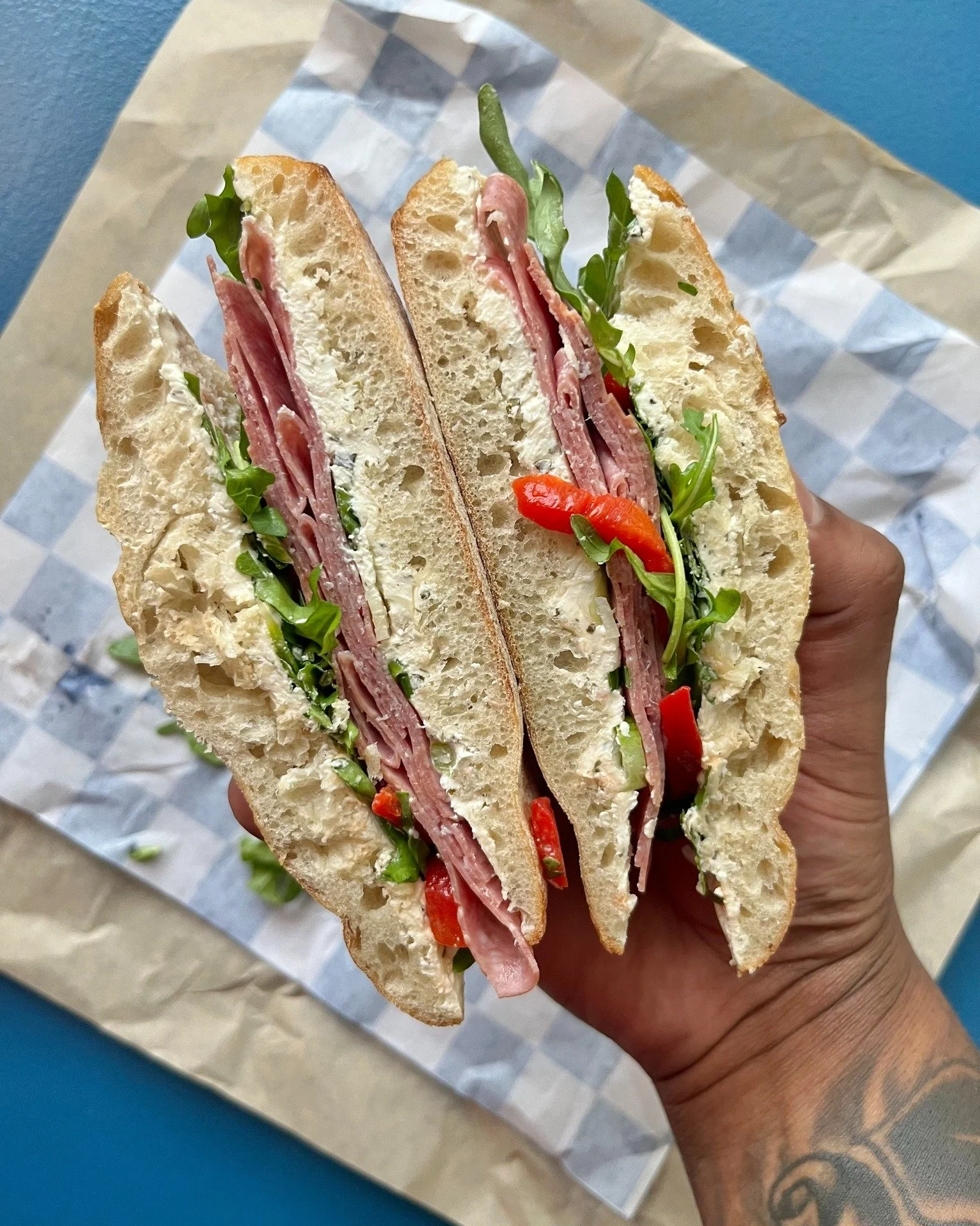 Hello, March! ☔🥪 Today's featured Salami on Ciabatta is layered with roasted red peppers, scallions, herb creamy cheese, and peppery arugula&mdash;just the kind of lunch your Tuesday deserves. Here is the 3/3 GRAB &amp; GO menu. 🥣  #ginghammarket