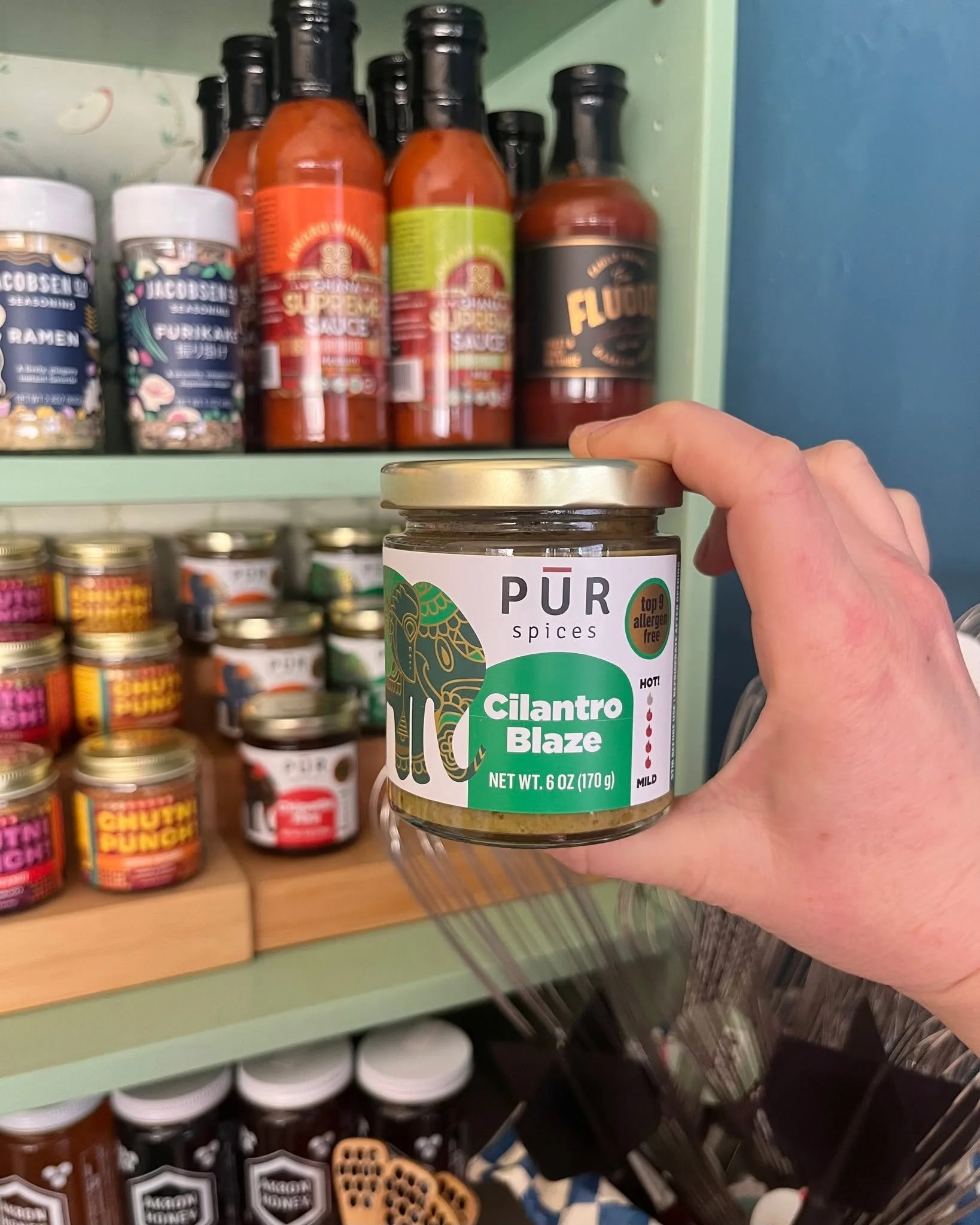 Local spotlight alert. 💚 @purspices Cilantro Blaze is bright, herby, and just a touch spicy&mdash;perfect on sandwiches, tacos, soups, or straight from the spoon. A new pantry favorite is waiting on our shelves. 🧺🔥 #ginghammarket