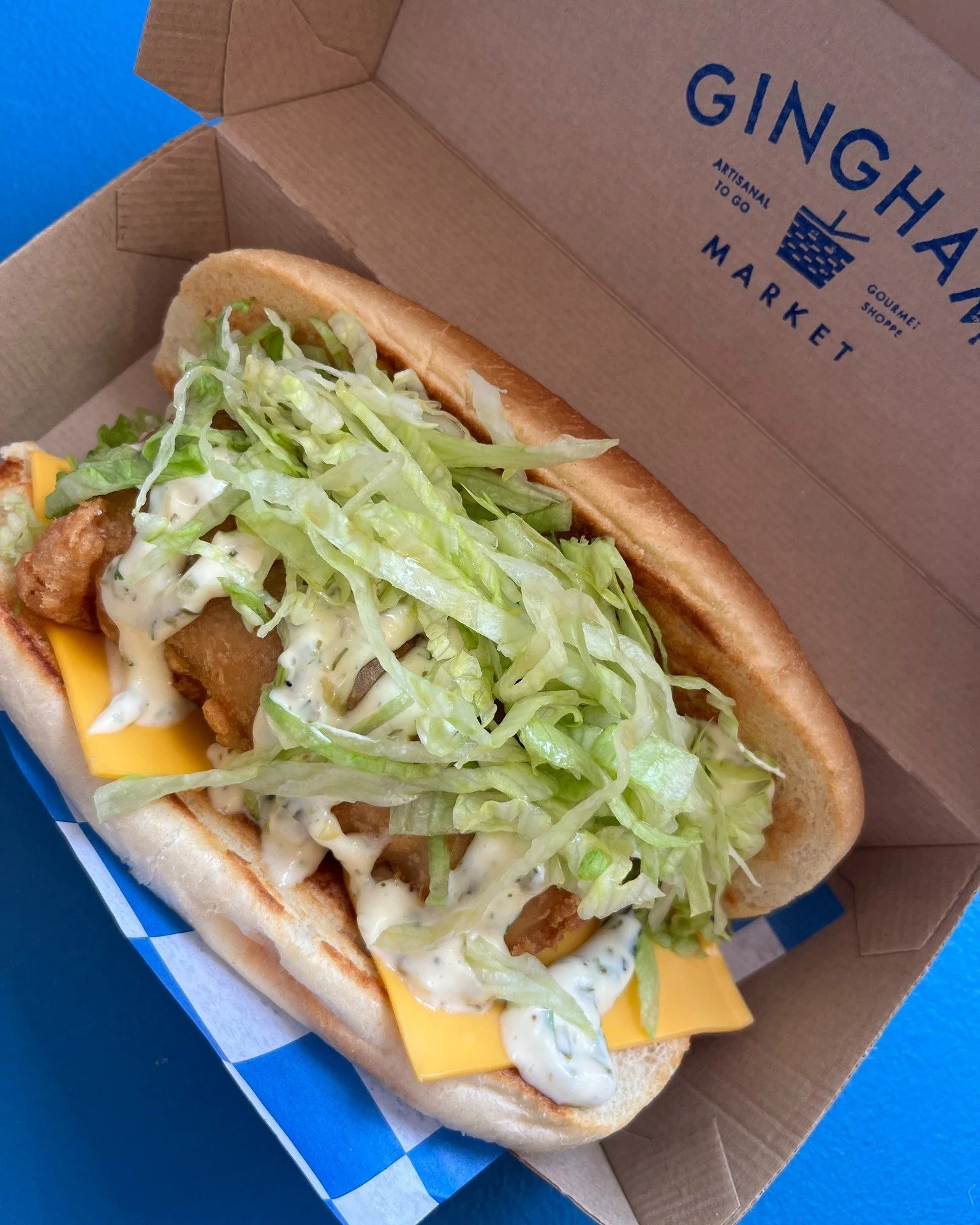Are you ready, Friday?! Fish Sandwiches are BACK, the sun is shining, and the bistro chairs are out. 🐟☀🧺 Stop in to grab your first pick from our 3/6 GRAB &amp; GO &mdash; open until 6pm. #ginghammarket
