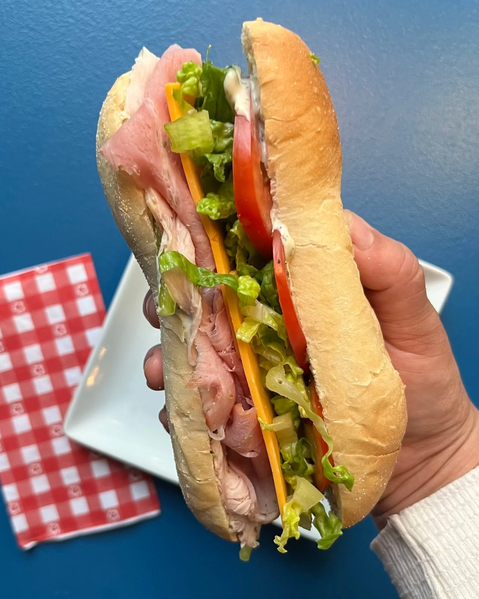 Don&rsquo;t let the rain keep you from a good lunch. ☔💙 The Modest Hero is on the menu today&mdash;paired with Lasagna Soup, warm, hearty, and exactly what today calls for. 🥪🥣 #ginghammarket