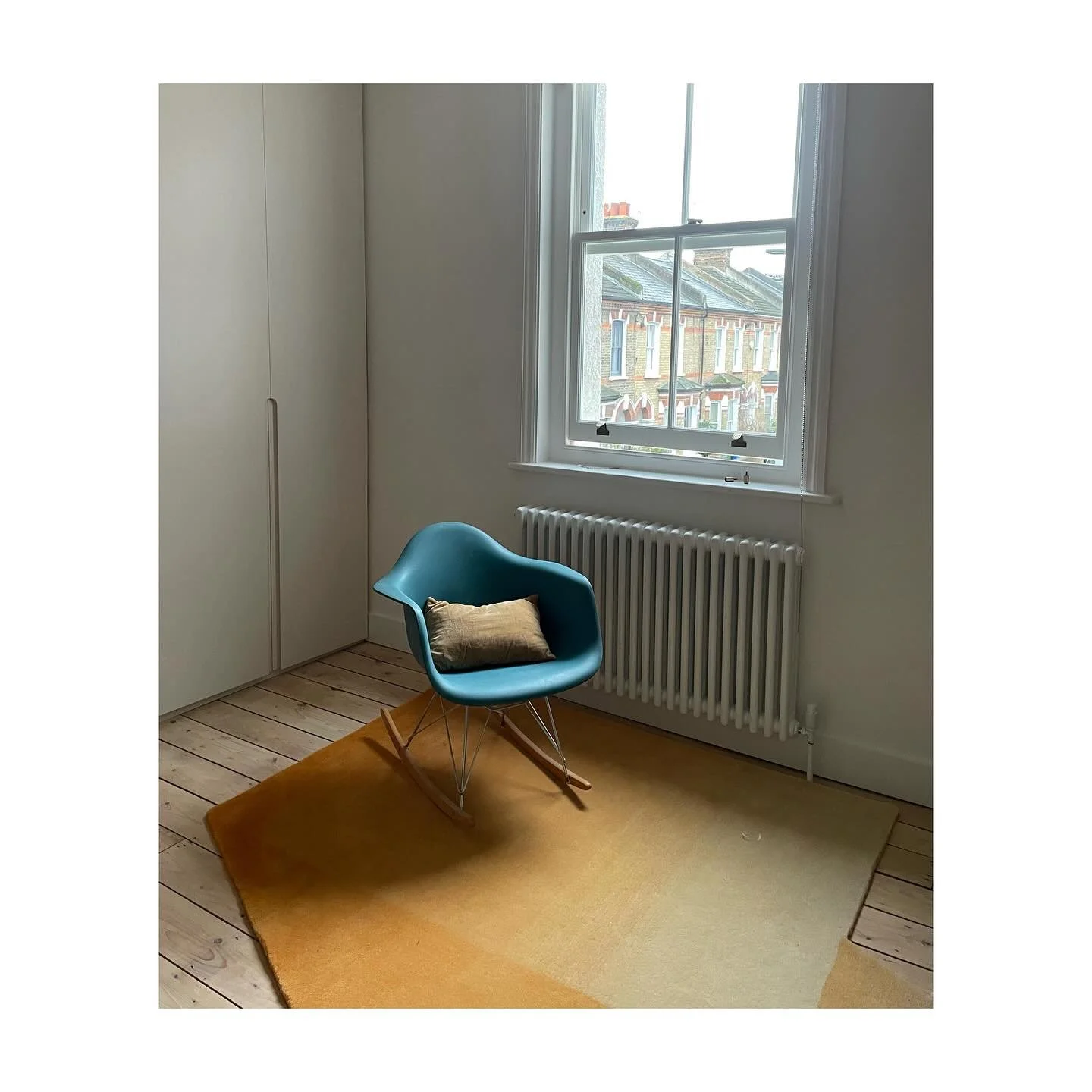 @sabine_marcelis rug ❤️ &amp; @eamesoffice rocking chair, united in calm morning light and patiently waiting for a curtain install.  #sabinemarcelis #eameschair