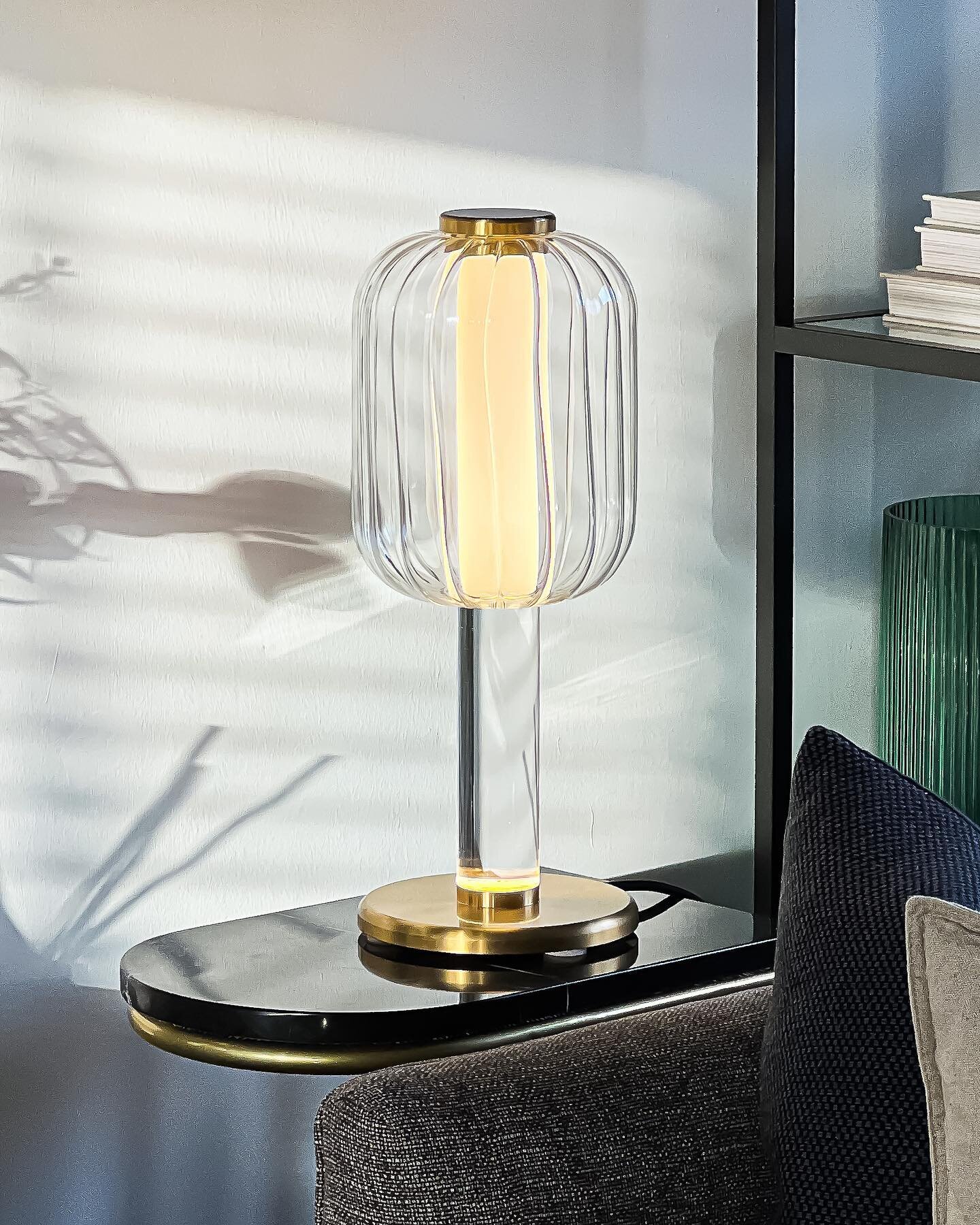 A personal favorite and our debut product, the ALMA Table Lamp, was launched in late November 2021. Seen here on a living room side table, setting a cosy ambiance.

The lamp playfully explores optical illusions using perspex TIR as a lighting guide, 