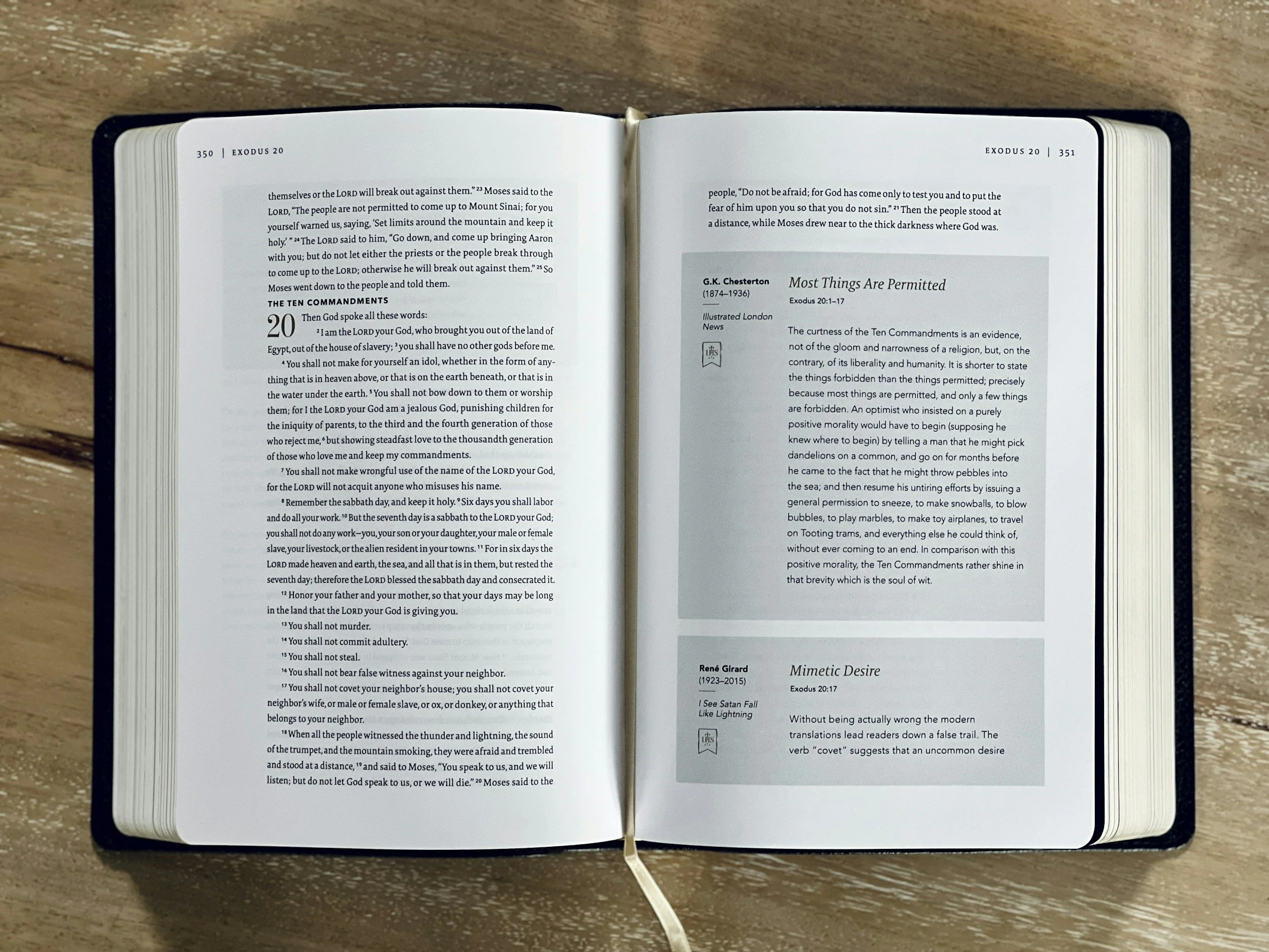 Bible on table open to 10 Commandments