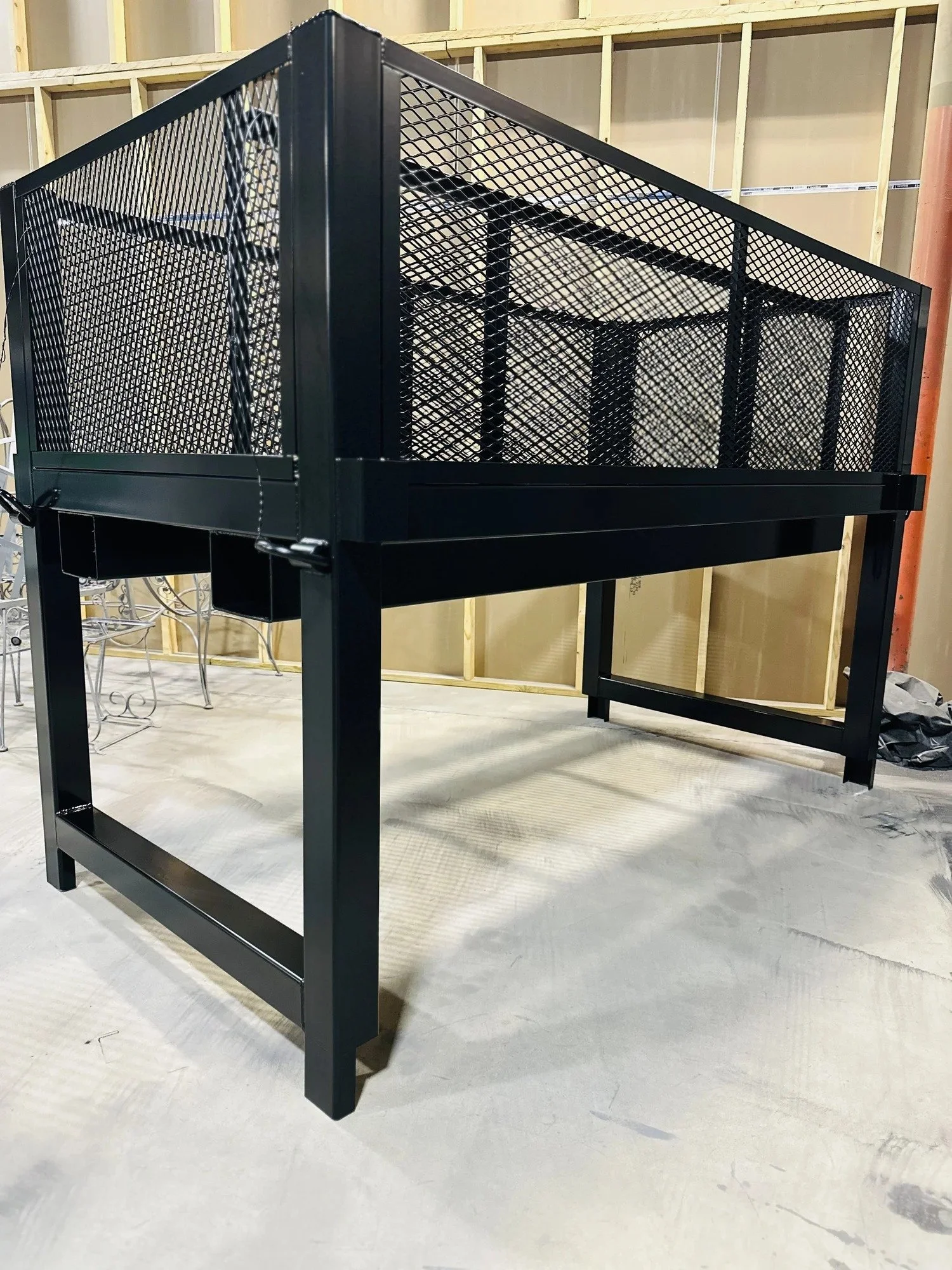 Black powder coated steel mesh fabrication in the ADK Blast N Coat shop