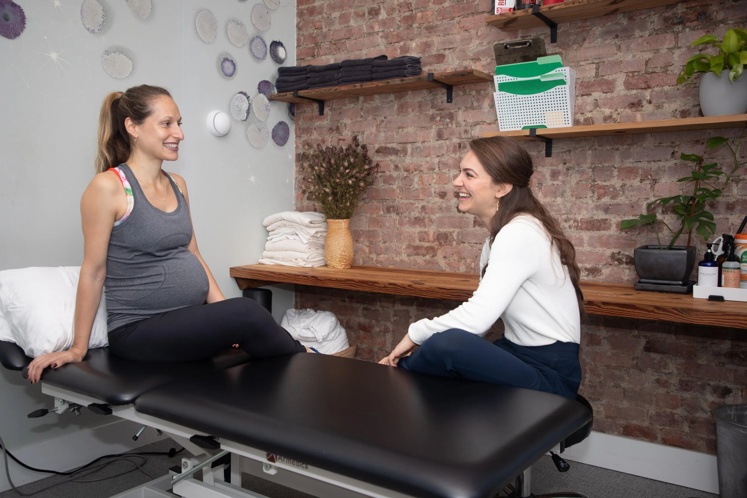 Physical therapy session with pregnant patient