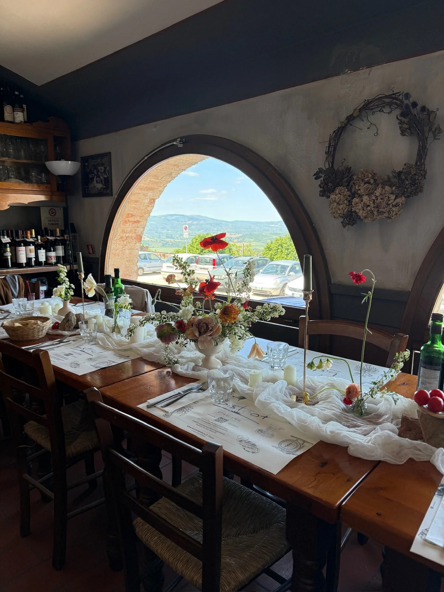Intimate private dinner table with floral arrangements and place settings