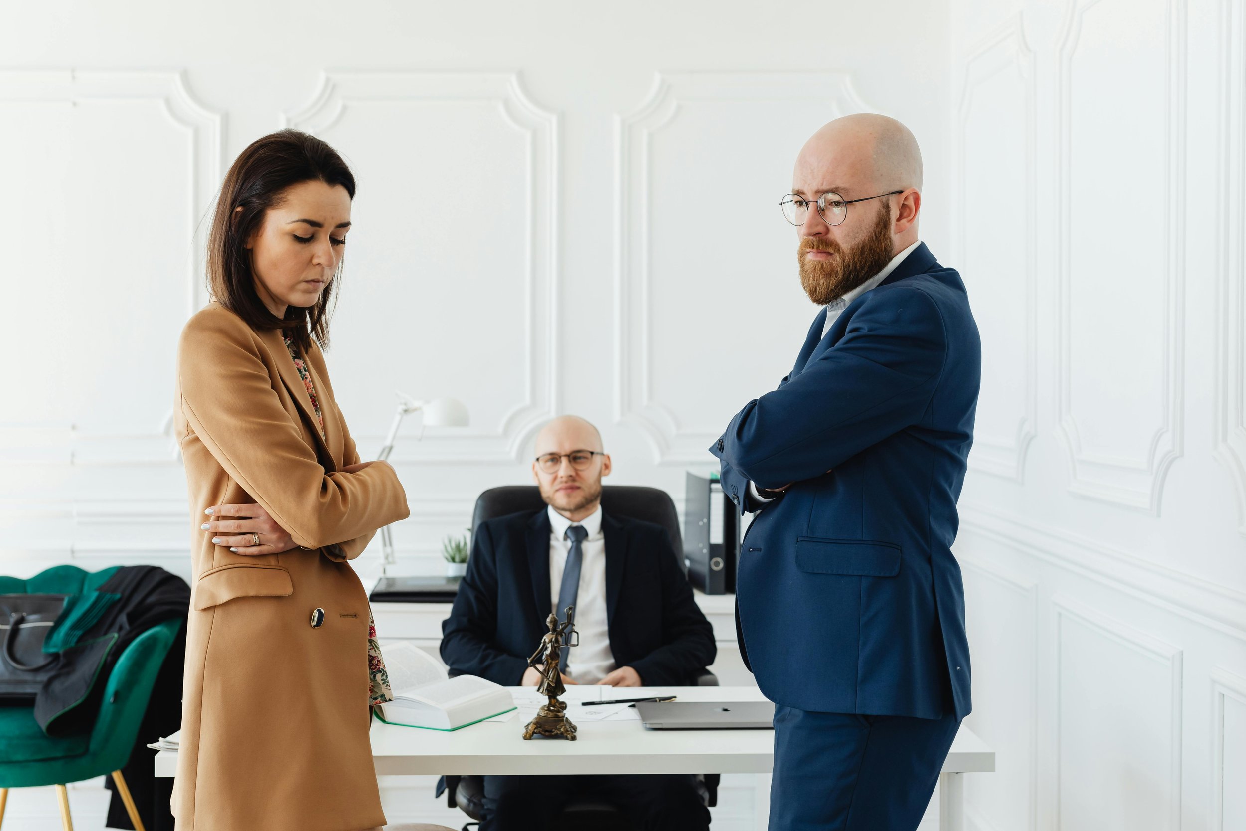 Woman taking things personally at work at a performance review.