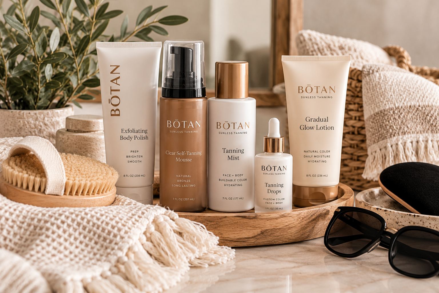 Sunless tanning and beauty products displayed with natural spa accessories in neutral tones