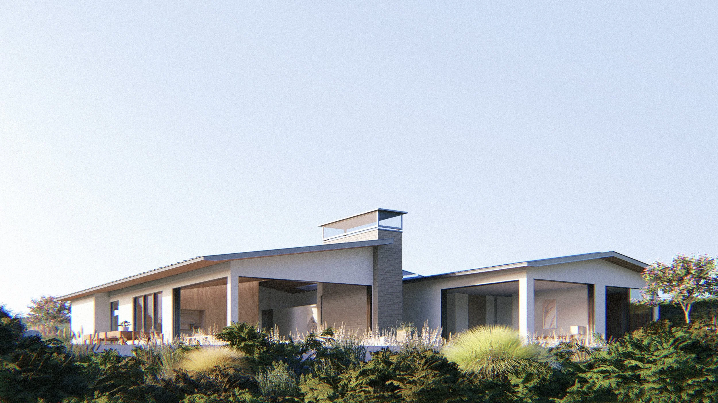 Exterior of the Palisades Residence, a modern coastal rebuild designed by a Los Angeles architect Rob Michel, set along the California landscape
