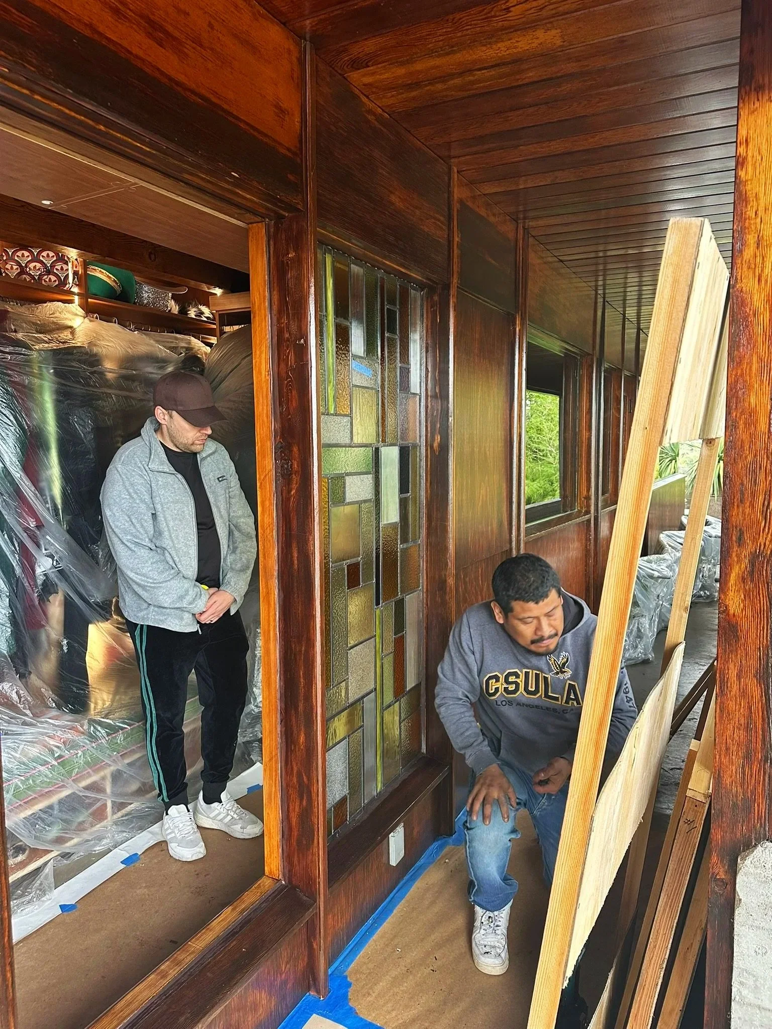 Installation of new stained glass windows at the De Jonghe Residence in Laurel Canyon, Los Angeles, designed by Rob Michel and Michel Architects