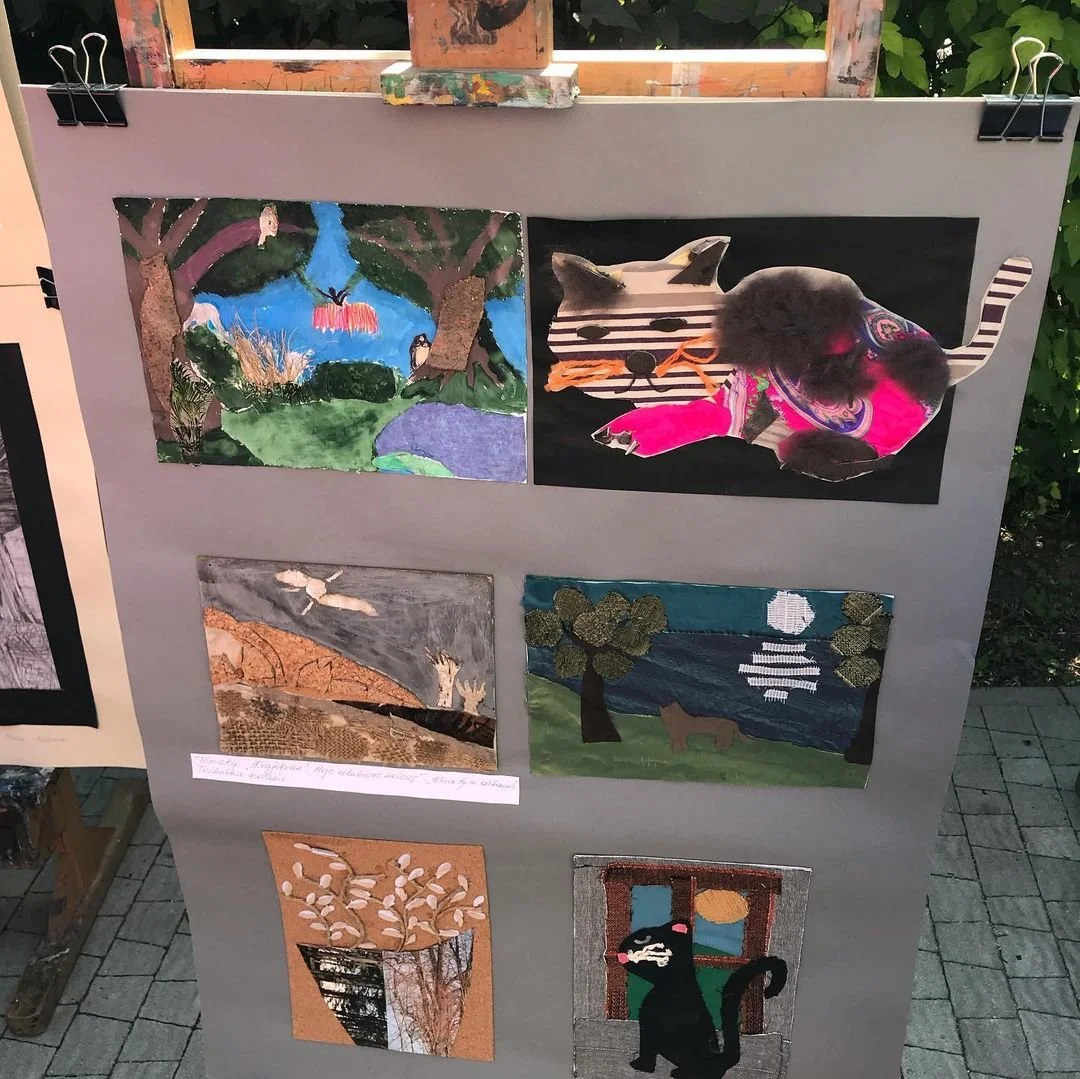 Collection of nine artistic fabric and paper collage artworks featuring nature scenes, animals, and abstract designs displayed on a grey background board.