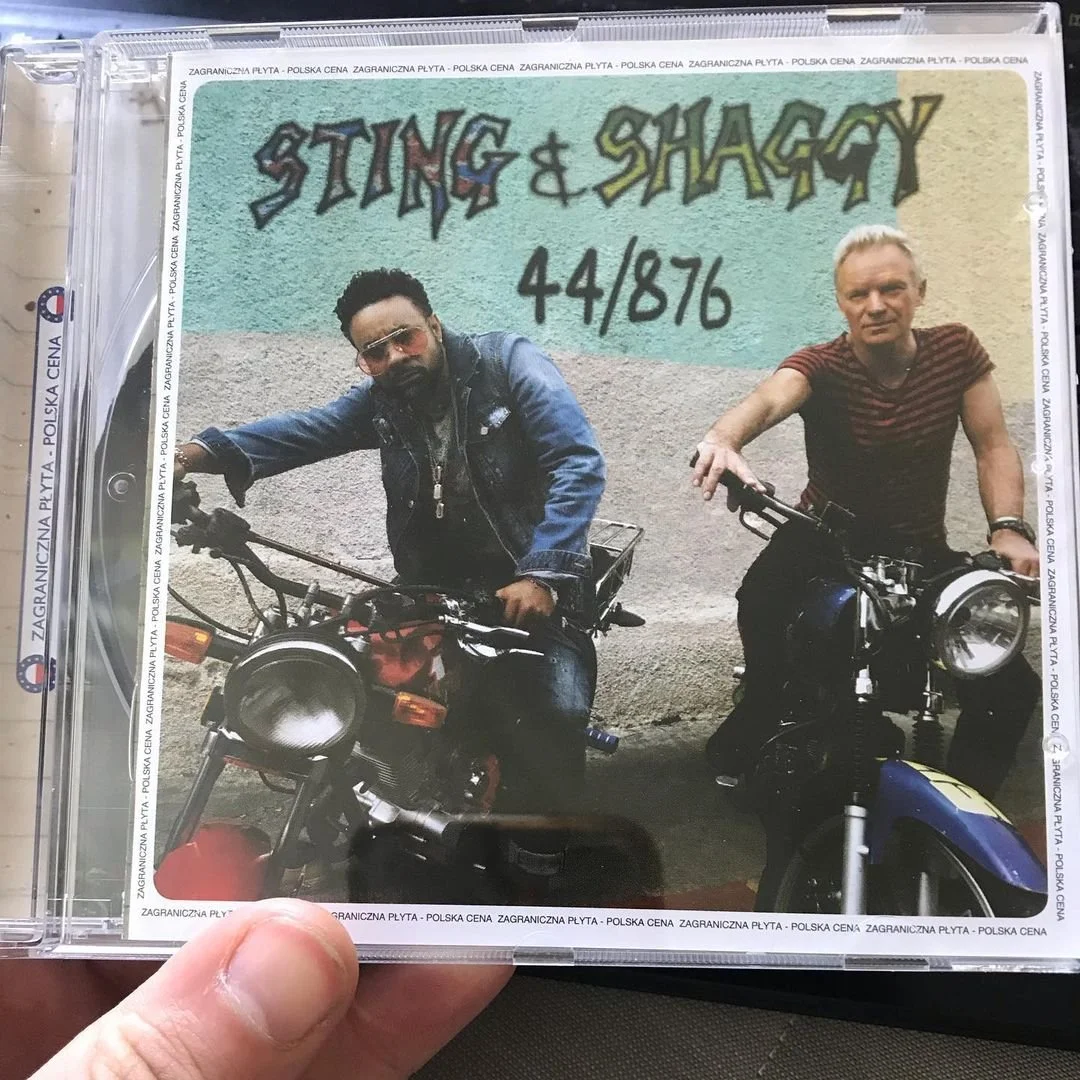 Album cover featuring two men on motorcycles against a colorful wall with graffiti-style writing that says "Sting & Shaggy 44/876".