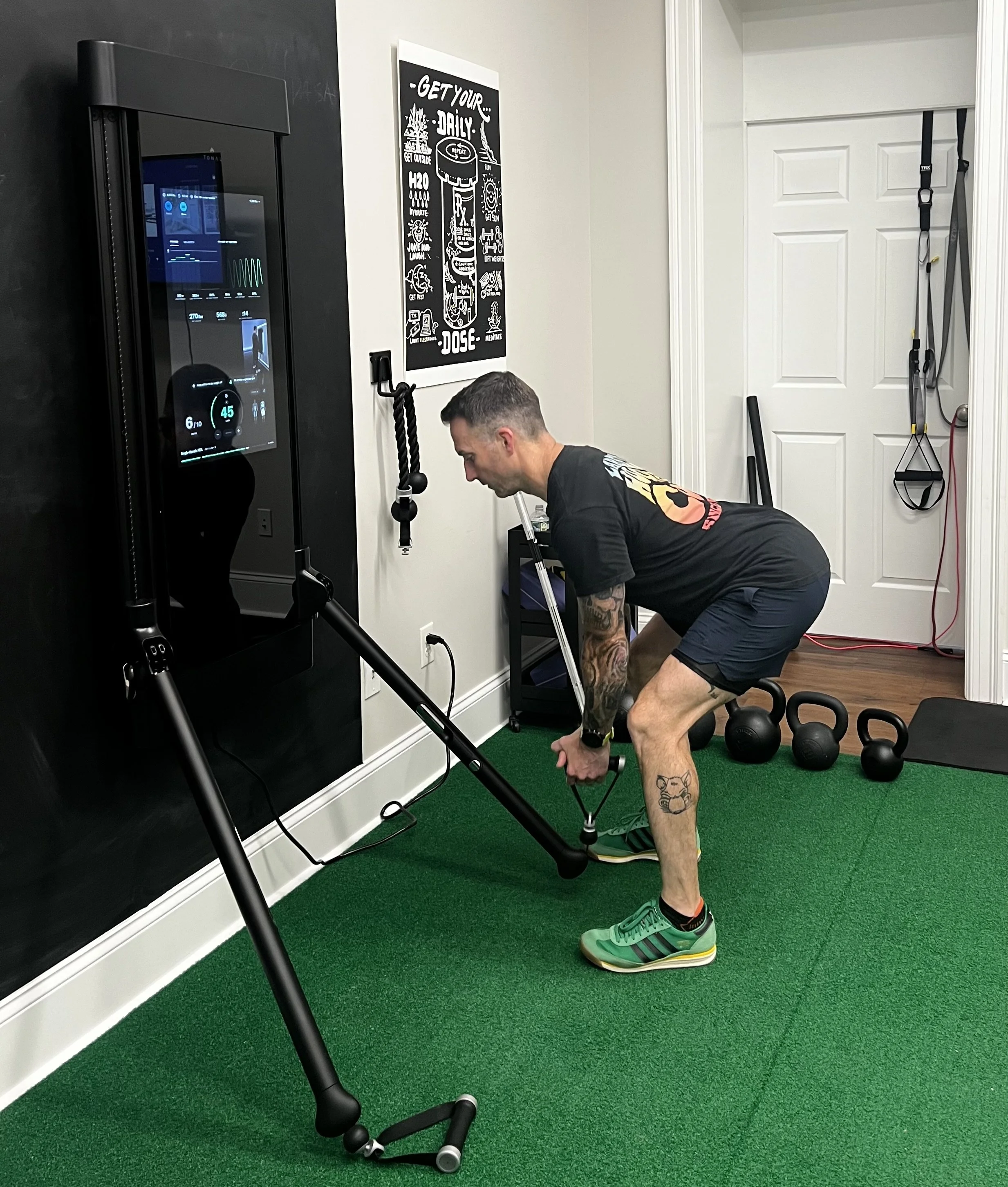 Patient performing a deadlift on Tonal 2 at Ecotone Performance Health and Fitness in Saratoga Springs, NY, as part of individualized strength and conditioning to improve strength, movement quality, and performance.