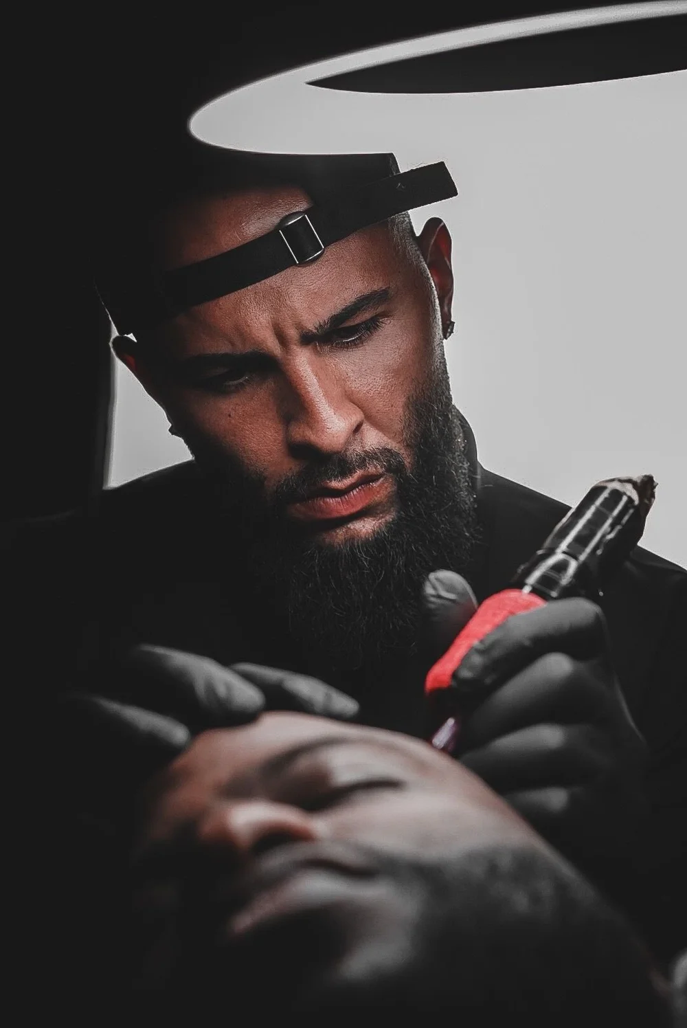 Angel Raws applying scalp micropigmentation at The SMP Factory in Jacksonville.