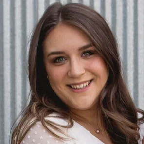 woman with brown hair smiling