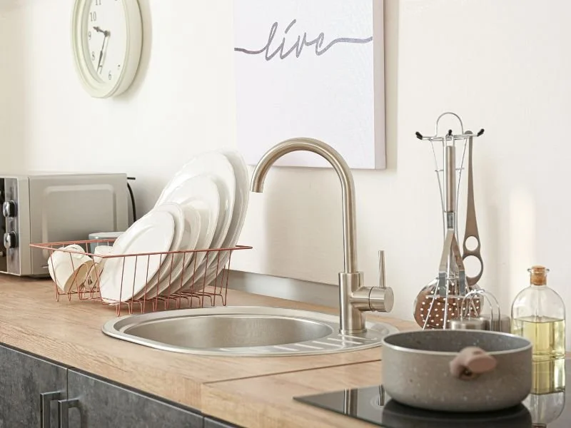 Neatly Organized Dishes at Sink