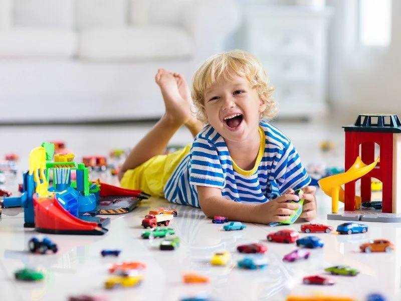 Boy with Toys