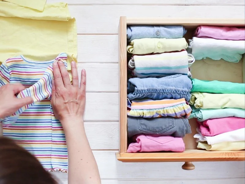 Organized drawer with neatly folded clothes.