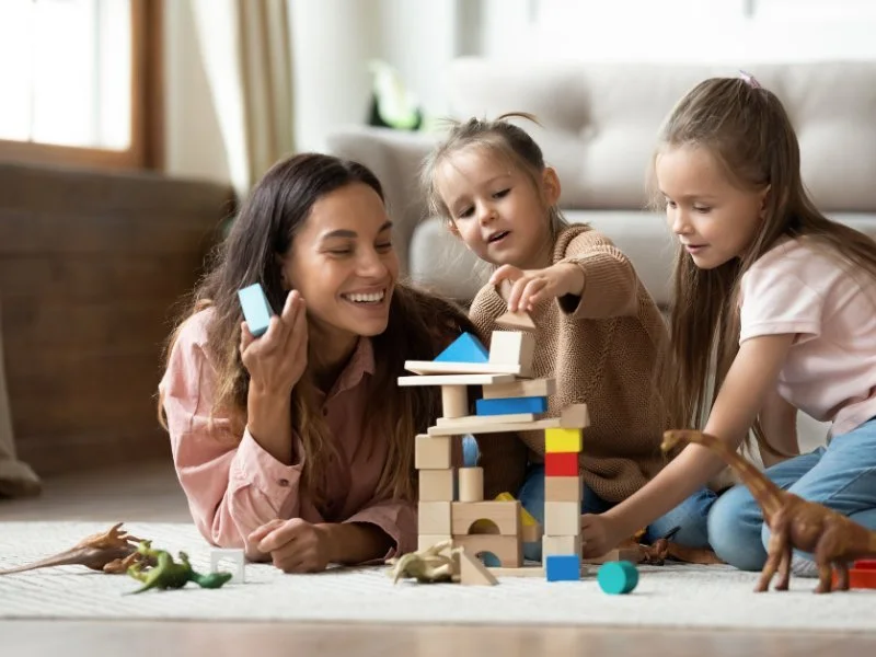 Family playing with building blocks.