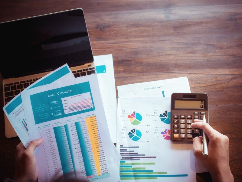 Reviewing financial charts and budgets.