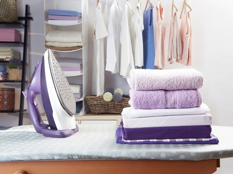 Ironing station, fresh linens prepared.