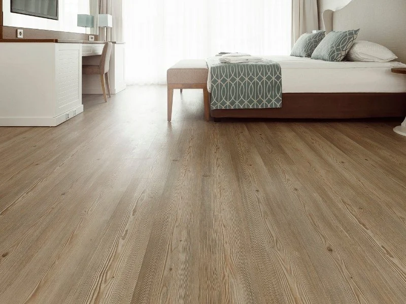 Hardwood flooring, serene bedroom retreat.