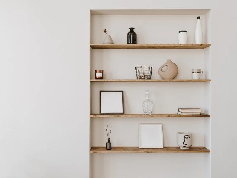 Minimal shelves, organized aesthetic space.