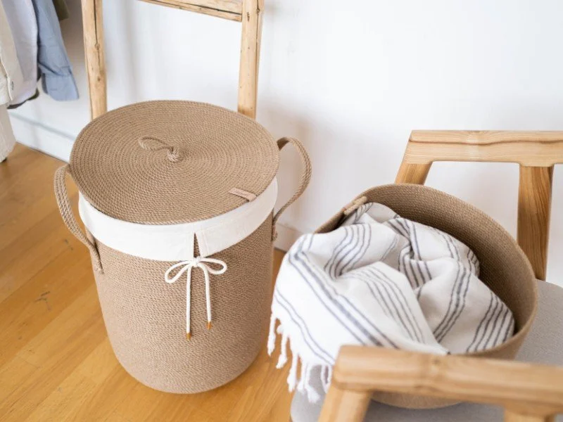 Stylish basket, functional laundry storage.