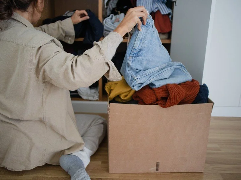 Decluttering wardrobe, simplifying daily choices.