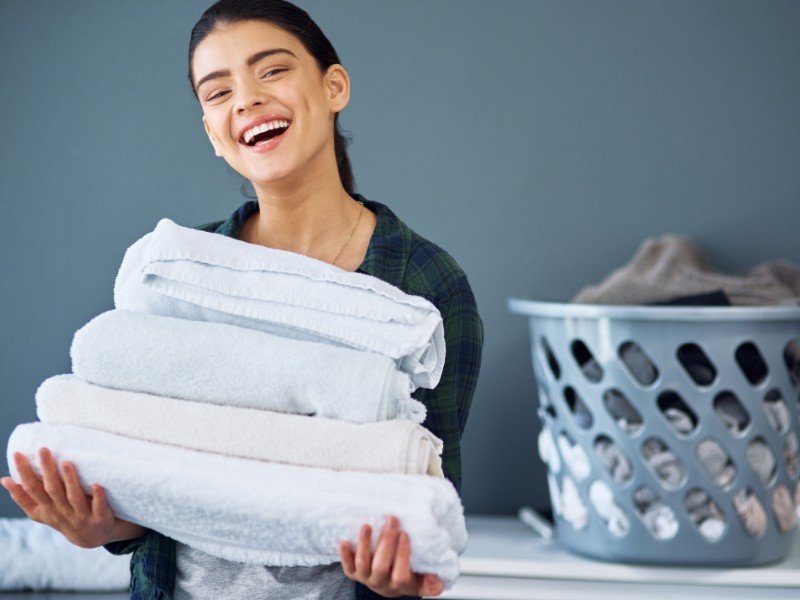 Laundry joy, fresh towels with smiles.
