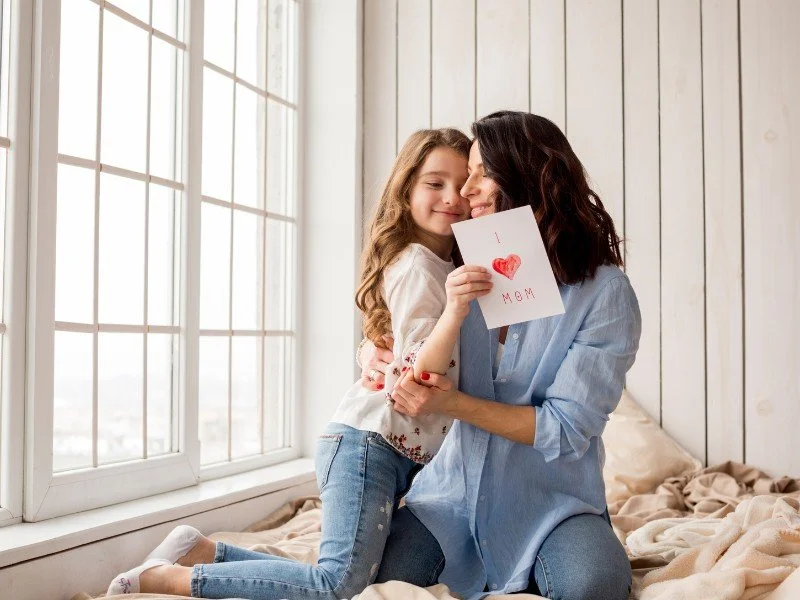 Mother-child bonding, heartfelt handmade cards.