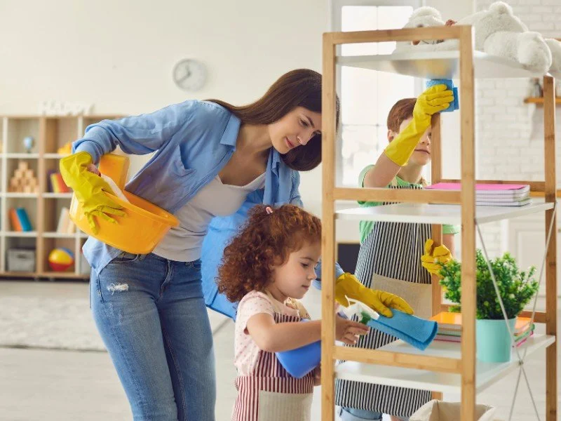 Teaching tidiness, playful cleaning moments.