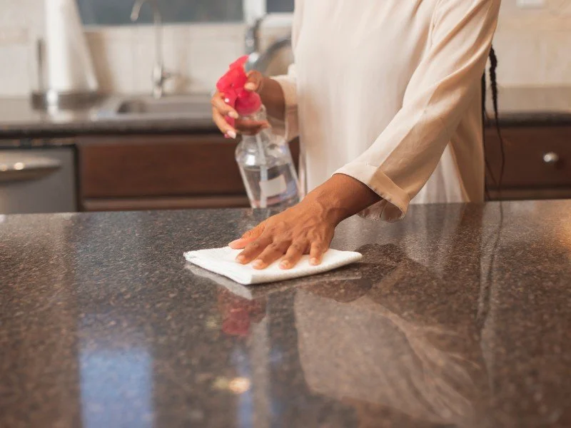 Cleaning counters, maintaining shiny surfaces.