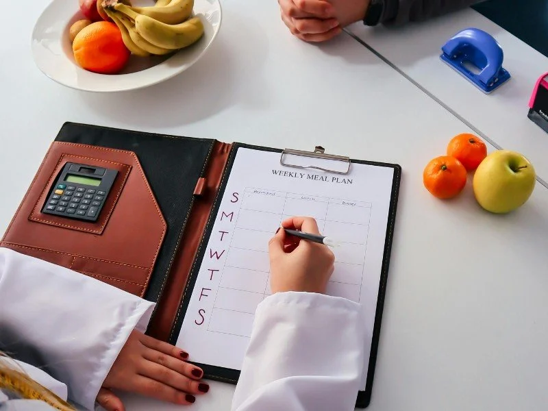 Planning meals for the week with focus.