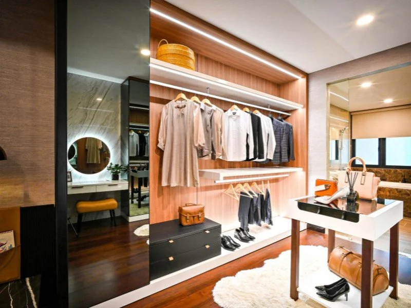 Stylish wardrobe showcasing organized clothing layout.