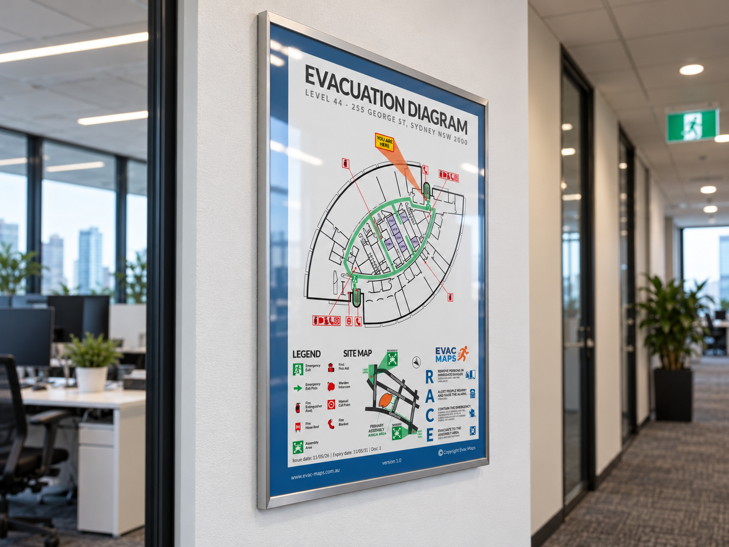 Emergency evacuation diagram mounted on an indoor wall of a building, showing level 44 floor plan with exits, fire safety equipment, and a legend in a modern office with glass walls and cityscape view.