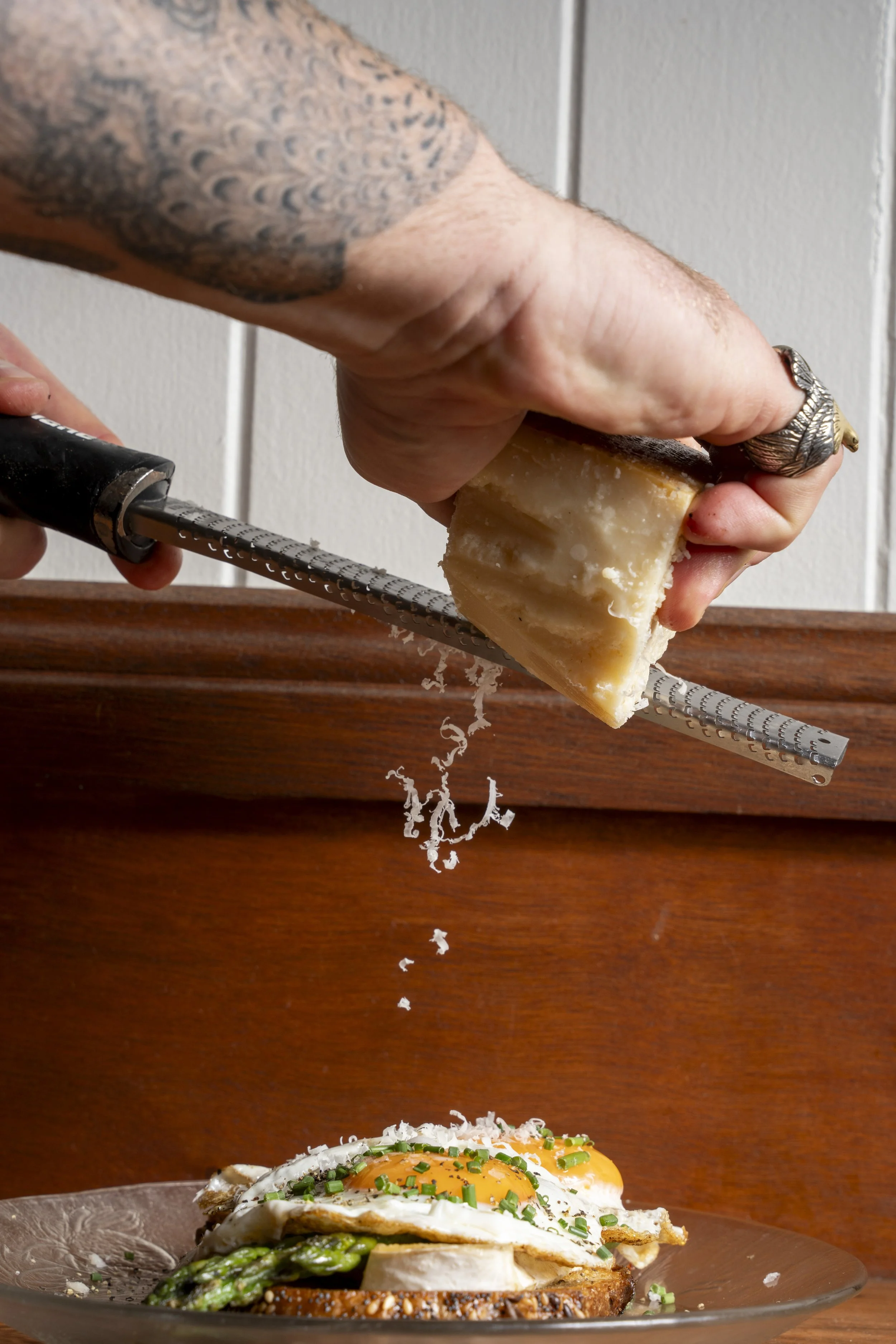 grated cheese over eggs breakfast. Gold Coast | Byron Bay Food Photography by Joey Bailey