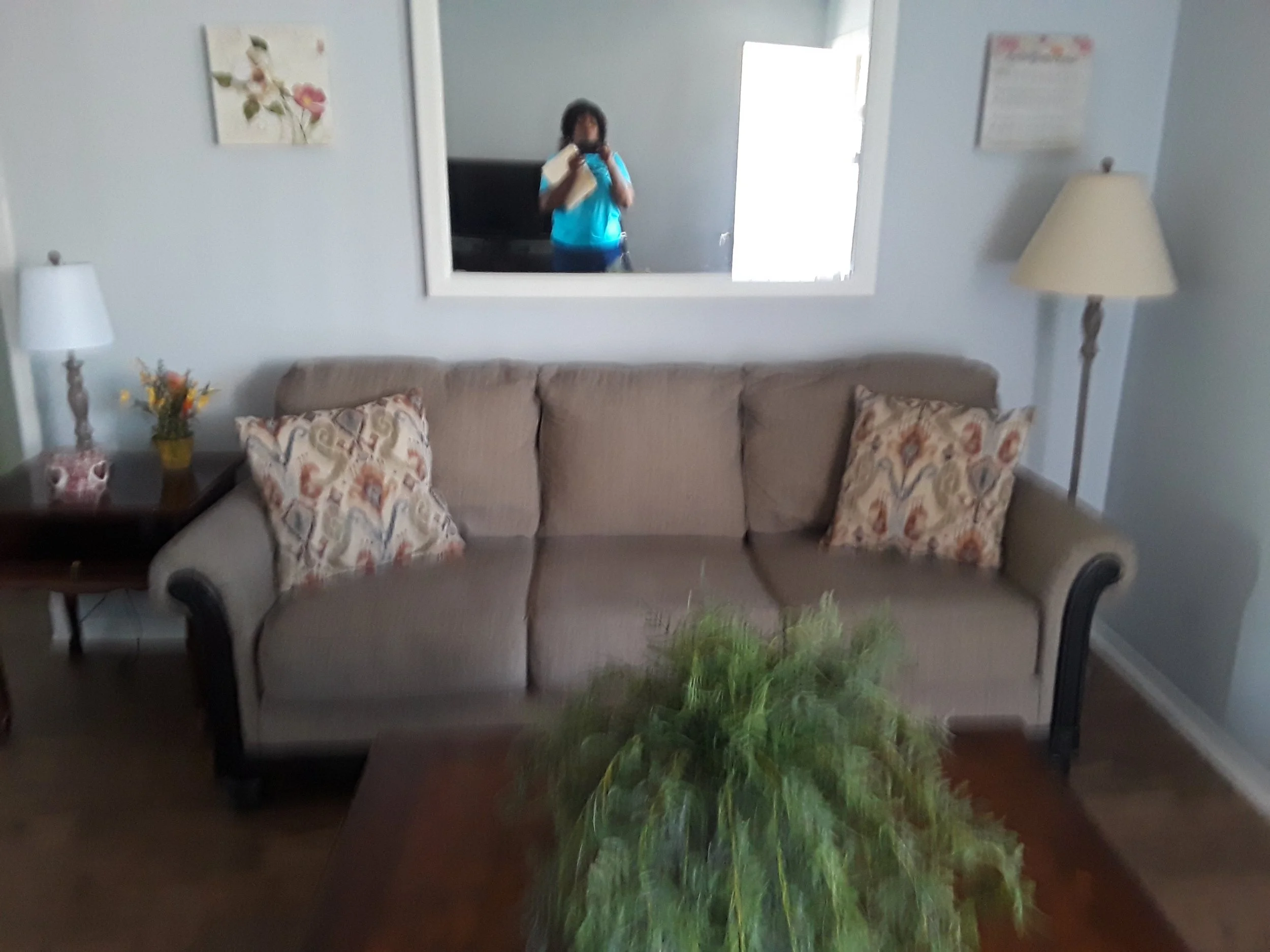 Living Room - we adopted an 2-bedroom, one bathroom apartment and fixed it up for a single mother and 3 kids