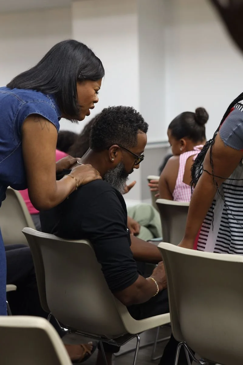 Jaylyn ministering to Michael.jpeg