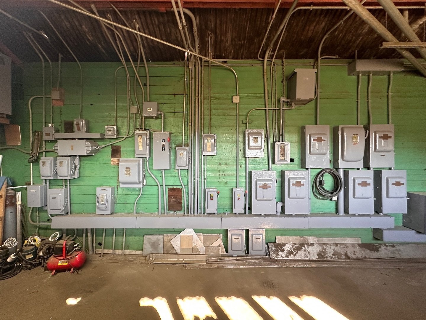 I don&rsquo;t know. This green wall with all these electrical panels at a site we were visiting looked really cool. What do you think?