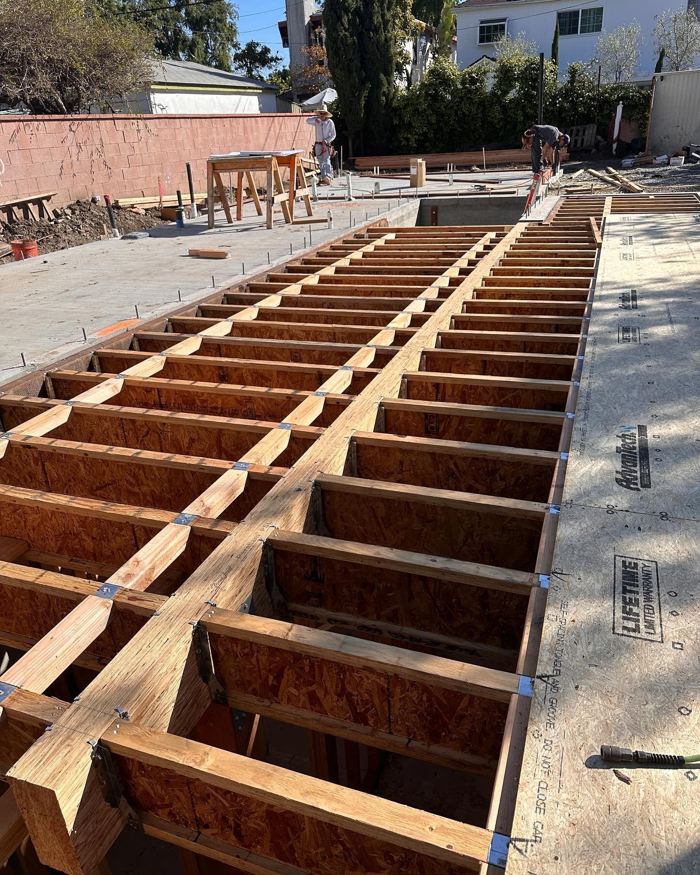 The transition from basement to 1st floor is almost complete at the Coolidge House. The stair framing just needs to go in, and upwards from there. 

#singlefamilyhome #architect #smallfirmarchitect #newconstruction #homeconstruction #basement #framin
