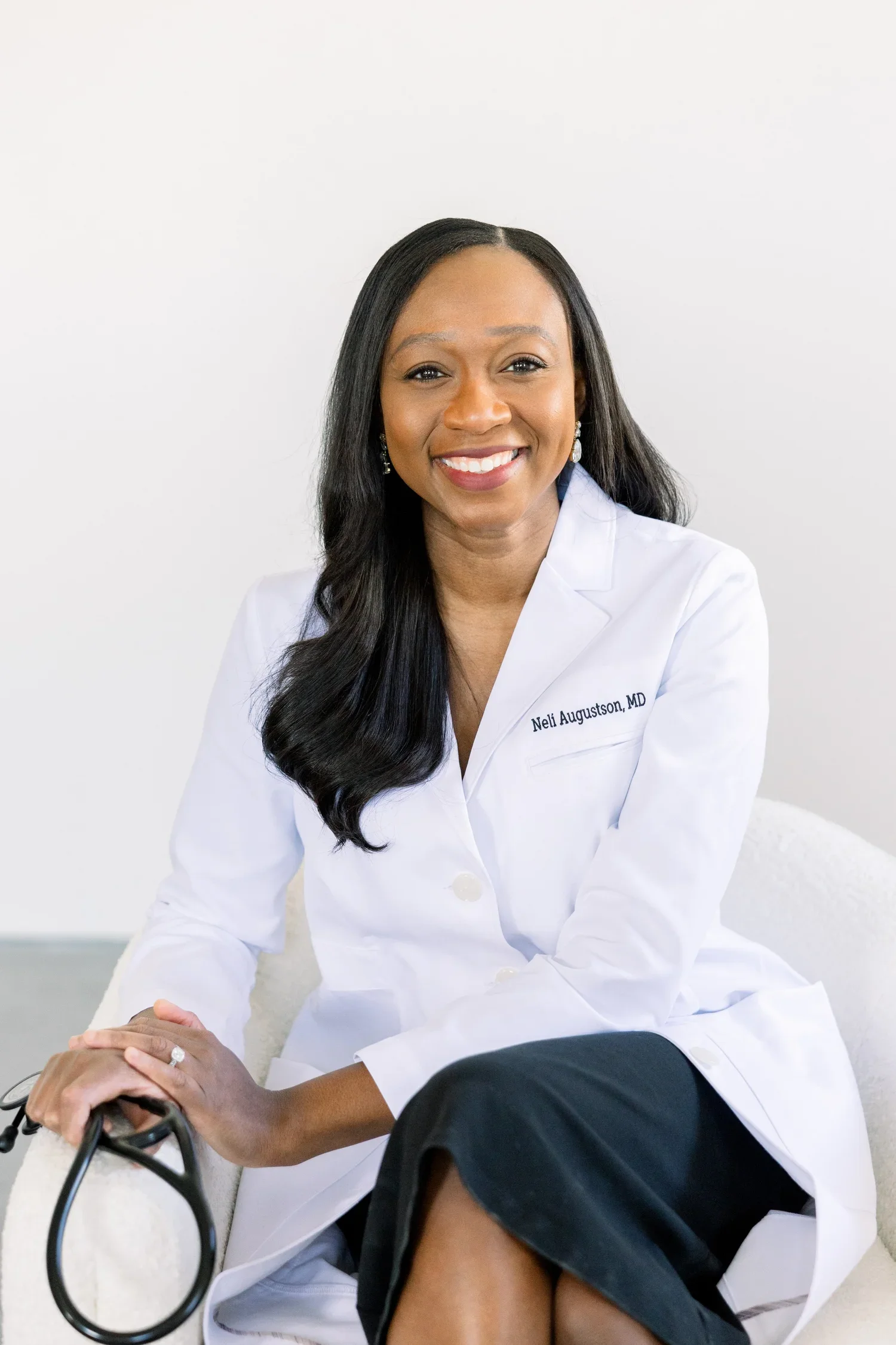Dr. Neli Augustson