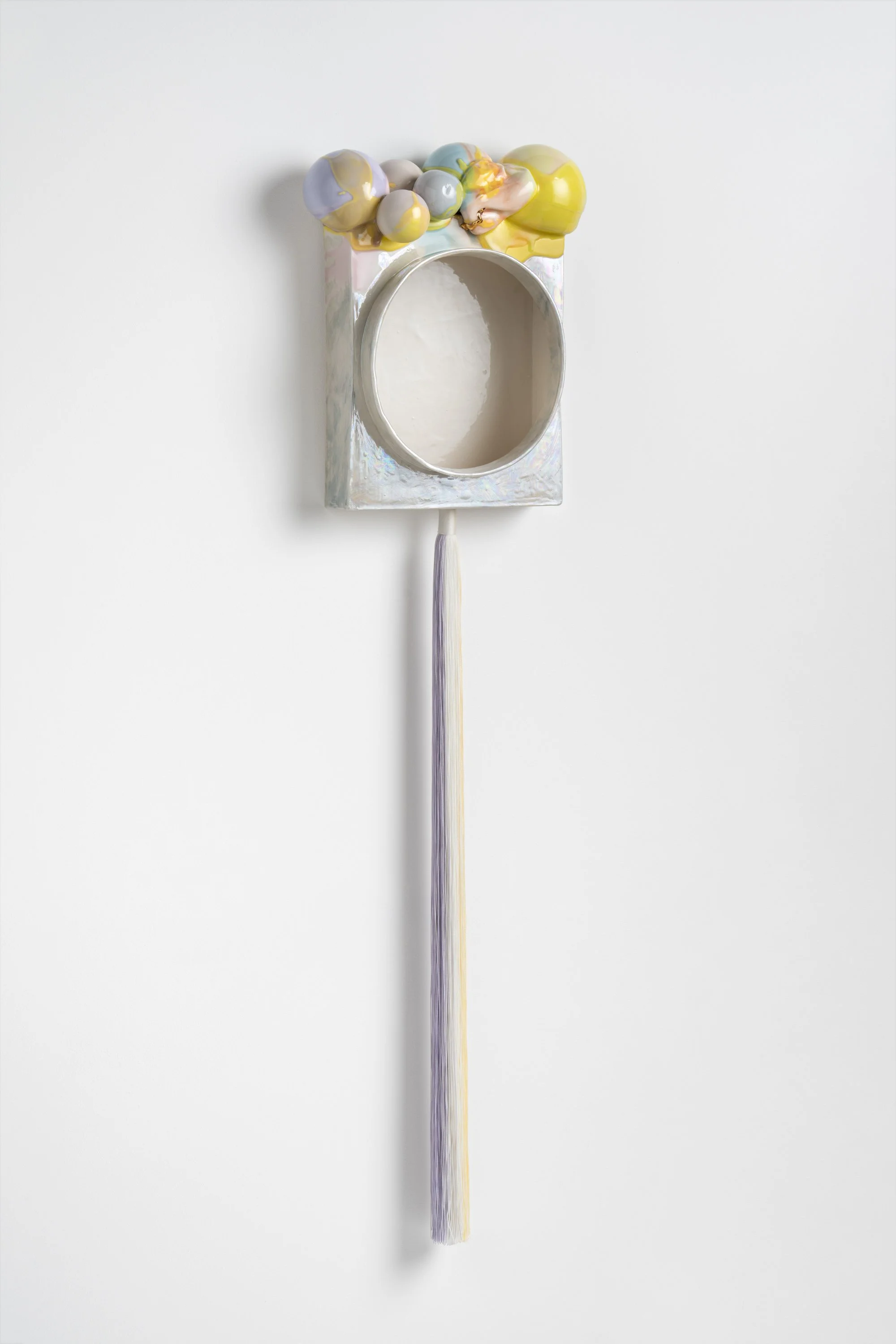Lucky charm, 2026. Porcelain, stain, glaze, lustre, nylon cord. 116h x 30w x 10d cm. Image: Mark Pokorny
