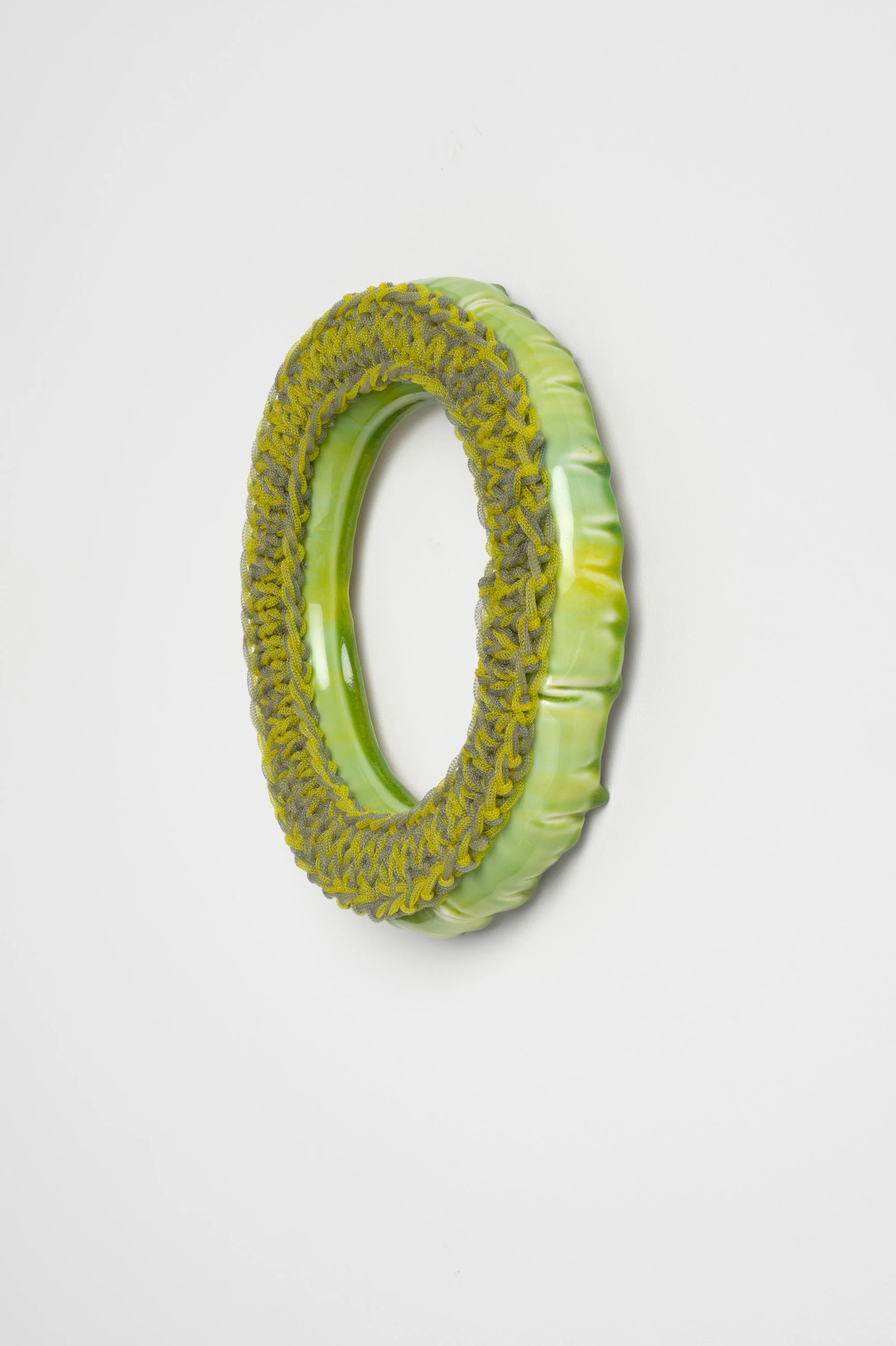 Momentum, 2026. Porcelain, glaze, nylon yarn, epoxy. 26h x 26w x 5d cm. Image: Mark Pokorny
